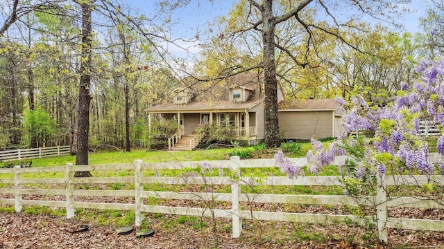 3613 Northlake Rd, Alexander, AR 72002 - view of front of home with a front yard, a porch, and a fenced front yard
