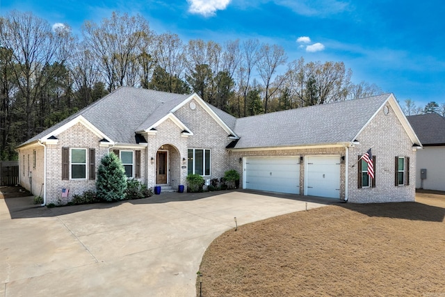 411 Sienna Lake Dr, Little Rock, AR 72210 - ranch-style home with driveway, brick siding, a garage, and roof with shingles