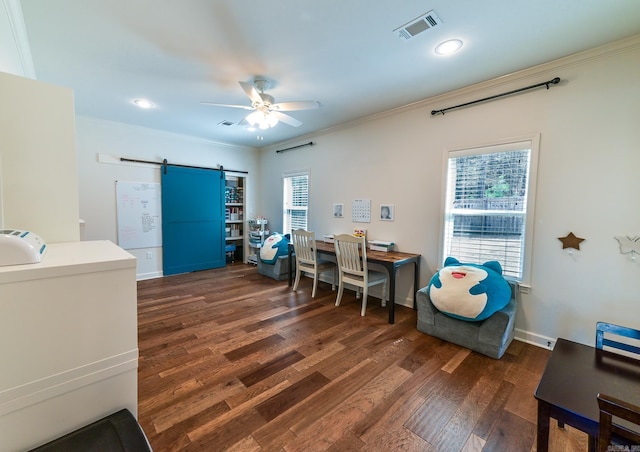 411 Sienna Lake Dr, Little Rock, AR 72210 - office featuring ornamental molding, dark wood finished floors, a barn door, ceiling fan, and visible vents