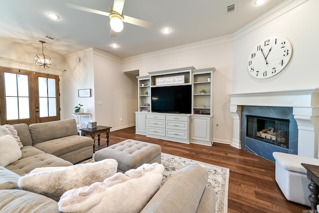 411 Sienna Lake Dr, Little Rock, AR 72210 - living area with dark wood finished floors, visible vents, crown molding, and ceiling fan