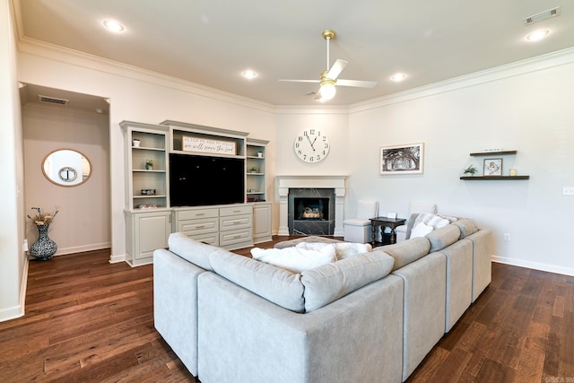 411 Sienna Lake Dr, Little Rock, AR 72210 - living area with a ceiling fan, dark wood-style floors, crown molding, and visible vents