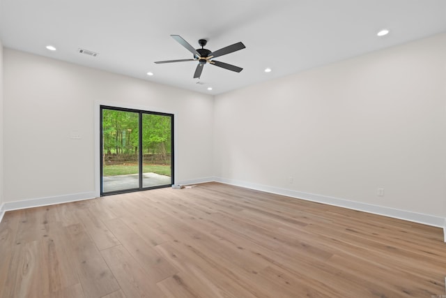 empty room featuring baseboards, visible vents, recessed lighting, and light wood-type flooring