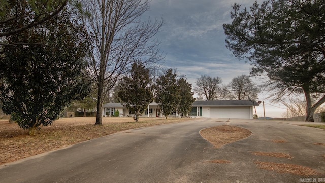 view of front of house with driveway and a garage