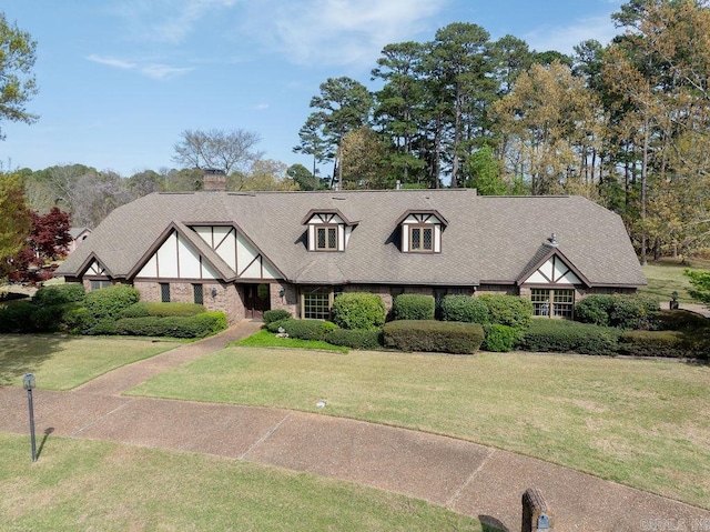 1110 Huntington Pl, Heber Springs, AR 72543 - english style home with roof with shingles and a front yard