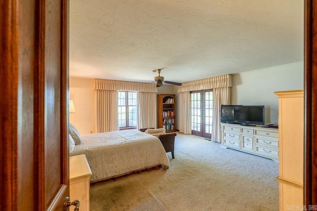 1110 Huntington Pl, Heber Springs, AR 72543 - carpeted bedroom featuring a textured ceiling, multiple windows, and a ceiling fan