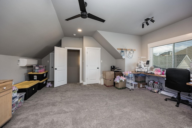 carpeted home office with a ceiling fan and lofted ceiling