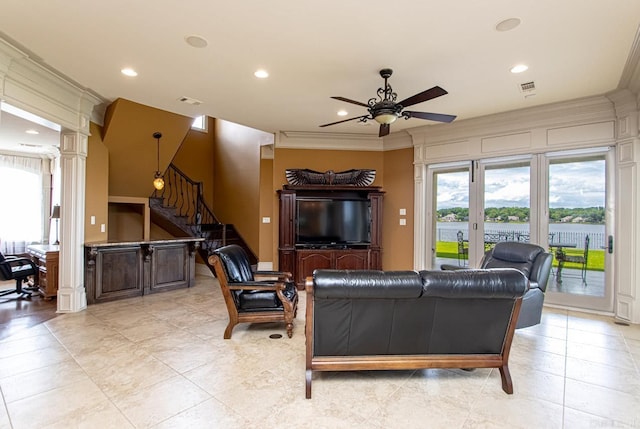 living room featuring stairs, ornate columns, recessed lighting, visible vents, and ceiling fan