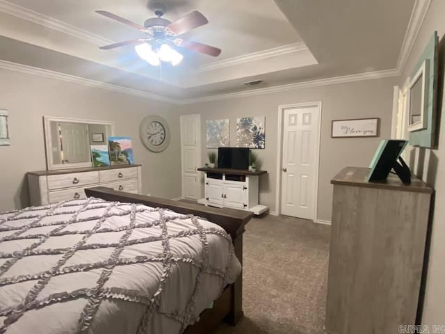 6 Timber Ridge Dr, Atlanta, TX 75551 - bedroom with ornamental molding, visible vents, dark colored carpet, and a raised ceiling