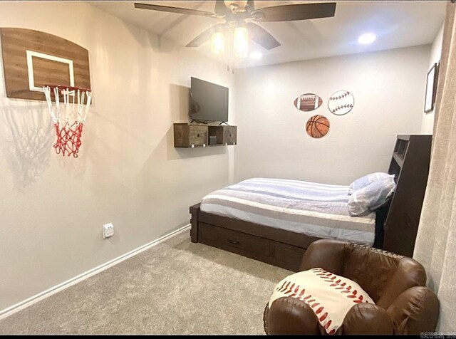 6 Timber Ridge Dr, Atlanta, TX 75551 - carpeted bedroom featuring baseboards and a ceiling fan