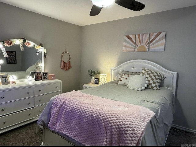 6 Timber Ridge Dr, Atlanta, TX 75551 - bedroom with ceiling fan and dark colored carpet