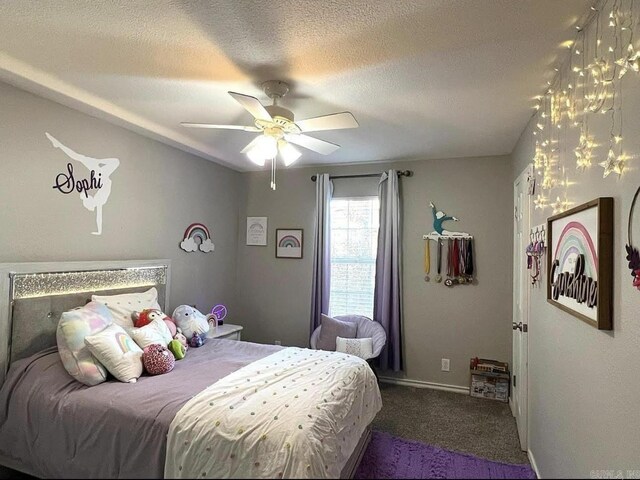 6 Timber Ridge Dr, Atlanta, TX 75551 - bedroom featuring a textured ceiling, a ceiling fan, and carpet