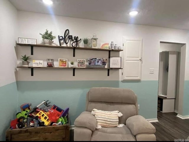 6 Timber Ridge Dr, Atlanta, TX 75551 - sitting room featuring baseboards and wood finished floors