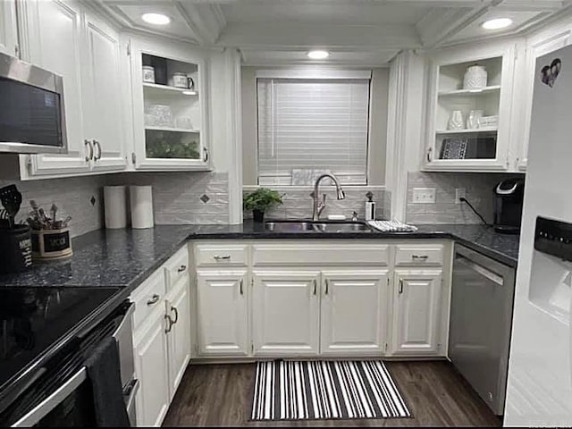 6 Timber Ridge Dr, Atlanta, TX 75551 - kitchen with white cabinetry, dark wood-style flooring, a sink, and stainless steel appliances
