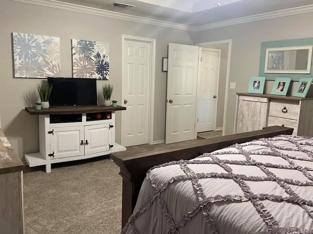 6 Timber Ridge Dr, Atlanta, TX 75551 - bedroom with dark carpet, baseboards, ornamental molding, and visible vents