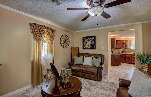 7200 Nell Dr, Pine Bluff, AR 71603 - living area featuring a textured ceiling, visible vents, ornamental molding, a ceiling fan, and light tile patterned floors