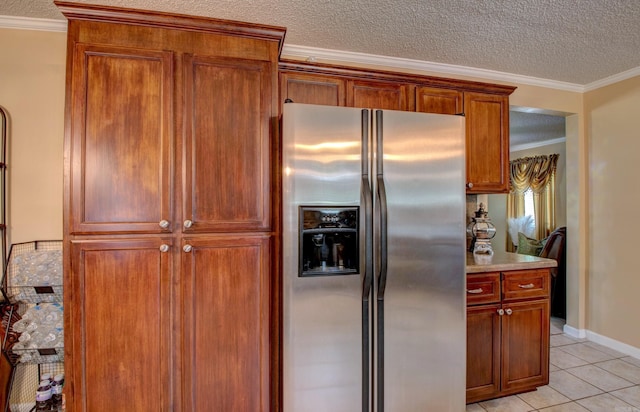 7200 Nell Dr, Pine Bluff, AR 71603 - kitchen with light tile patterned flooring, light countertops, stainless steel fridge, a textured ceiling, and ornamental molding