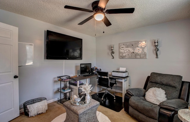 7200 Nell Dr, Pine Bluff, AR 71603 - office featuring a textured ceiling, carpet flooring, ceiling fan, and baseboards