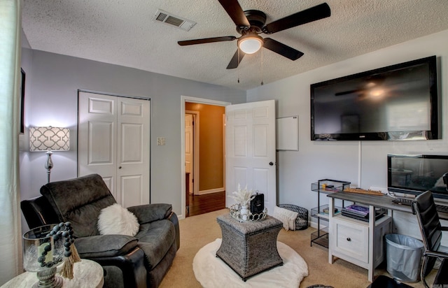 7200 Nell Dr, Pine Bluff, AR 71603 - office featuring carpet floors, visible vents, ceiling fan, and a textured ceiling