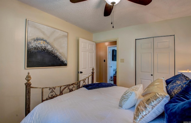 7200 Nell Dr, Pine Bluff, AR 71603 - bedroom featuring a closet, ceiling fan, and a textured ceiling