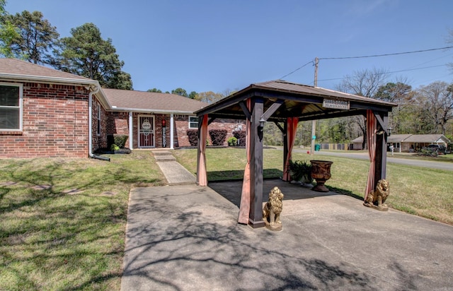 7200 Nell Dr, Pine Bluff, AR 71603 - view of patio with a gazebo and a carport