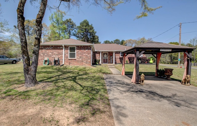 7200 Nell Dr, Pine Bluff, AR 71603 - ranch-style home with a gazebo, brick siding, a front lawn, driveway, and a detached carport
