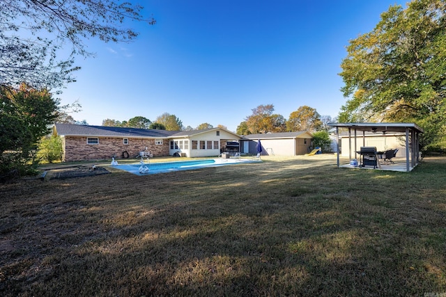 168 Leta Ln, Hot Springs, AR 71913 - view of yard with a storage unit, an outbuilding, a patio, and an outdoor pool