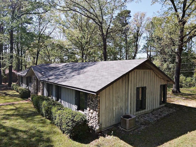 view of outbuilding with central air condition unit