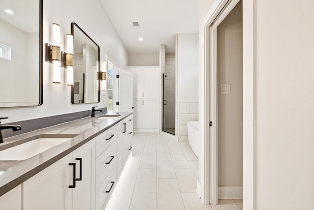 6172 Majestic Waters Dr, Alexander, AR 72002 - bathroom with a stall shower, a bathtub, double vanity, healthy amount of natural light, and recessed lighting