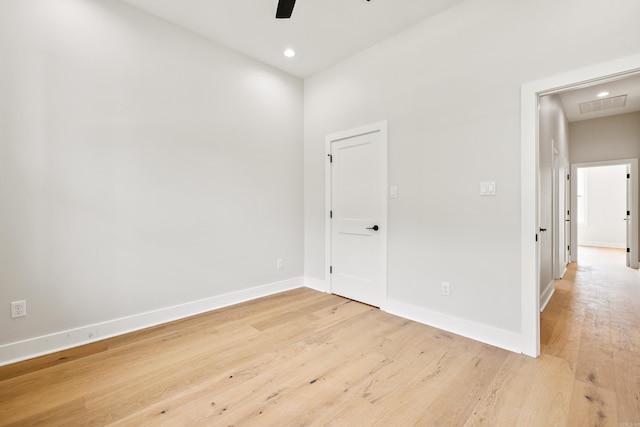 6172 Majestic Waters Dr, Alexander, AR 72002 - spare room with light wood-type flooring, ceiling fan, baseboards, recessed lighting, and attic access