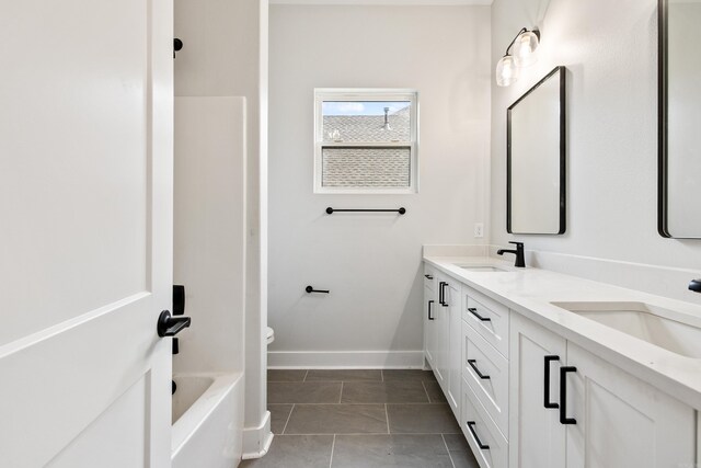 6172 Majestic Waters Dr, Alexander, AR 72002 - bathroom featuring double vanity, baseboards, and toilet