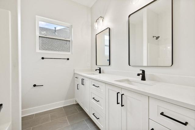 6172 Majestic Waters Dr, Alexander, AR 72002 - full bathroom featuring double vanity and baseboards