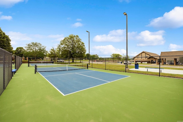 6172 Majestic Waters Dr, Alexander, AR 72002 - view of tennis court with community basketball court