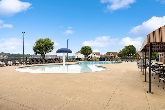 6172 Majestic Waters Dr, Alexander, AR 72002 - community pool with a patio