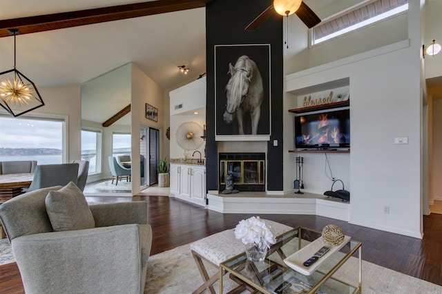 101 Long Island Dr Unit 605, Hot Springs, AR 71913 - living room with ceiling fan with notable chandelier, high vaulted ceiling, beamed ceiling, and dark wood-style floors