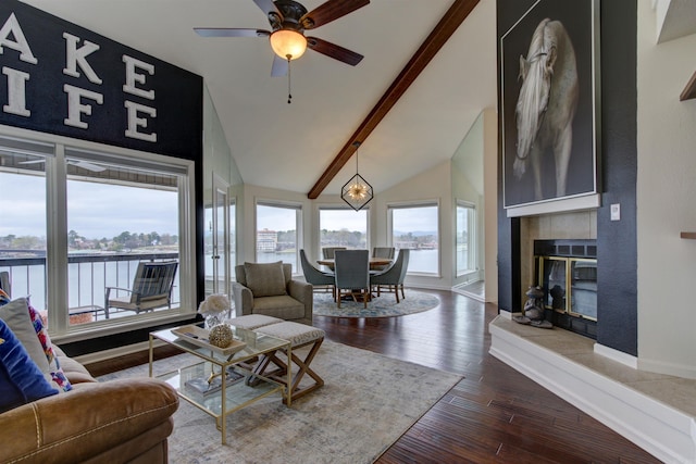 101 Long Island Dr Unit 605, Hot Springs, AR 71913 - living room featuring ceiling fan, dark wood-style flooring, baseboards, and a water view