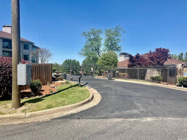101 Long Island Dr Unit 605, Hot Springs, AR 71913 - view of street with a gated entry, curbs, and a gate