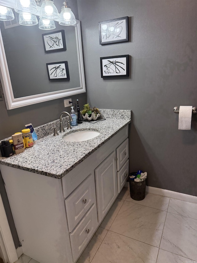 230 Berg Ave, Camden, AR 71701 - bathroom featuring vanity and baseboards