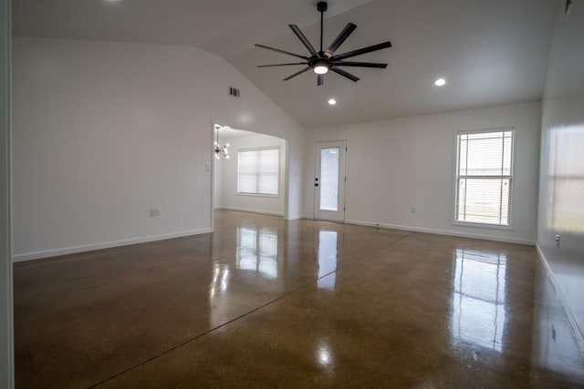 spare room with ceiling fan with notable chandelier, baseboards, visible vents, and a healthy amount of sunlight