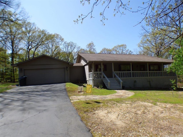 302 Veranda, Pearcy, AR 71964 - ranch-style house featuring a garage, a front yard, driveway, and covered porch