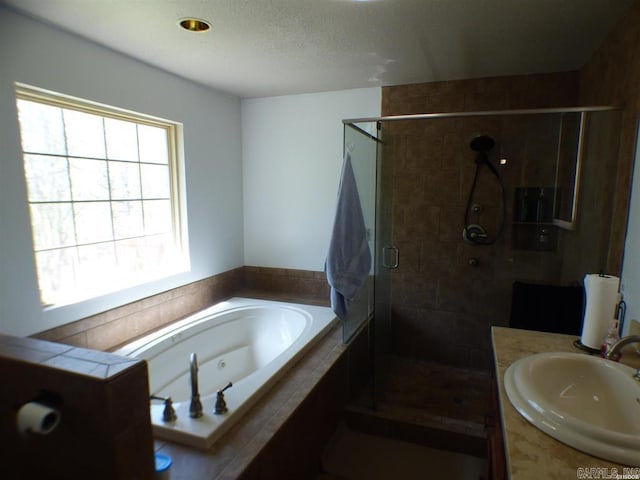 302 Veranda, Pearcy, AR 71964 - bathroom featuring a shower stall, vanity, and a tub with jets