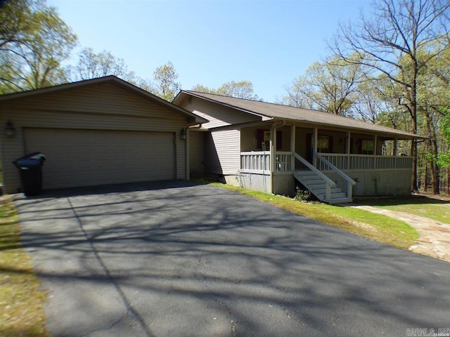 302 Veranda, Pearcy, AR 71964 - ranch-style home featuring driveway, an attached garage, and covered porch