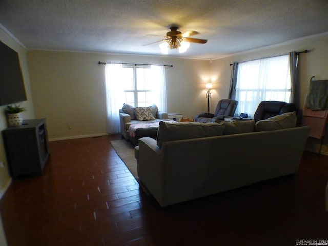 302 Veranda, Pearcy, AR 71964 - living area featuring dark wood-style floors, a textured ceiling, crown molding, and a ceiling fan