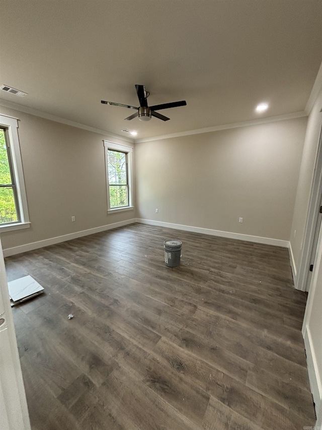 228 Michelle Dr, Beebe, AR 72012 - spare room featuring ornamental molding, baseboards, ceiling fan, and dark wood-style floors