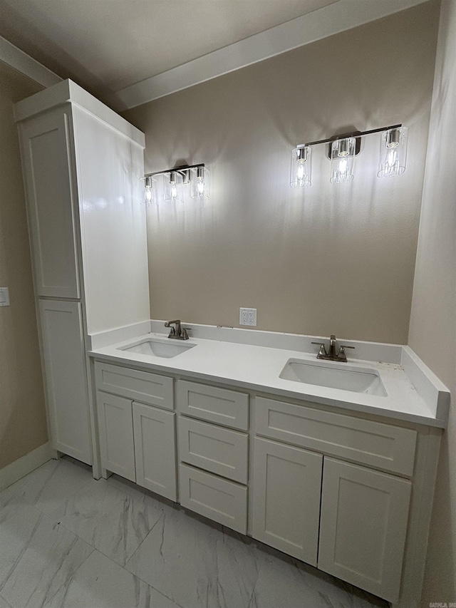 228 Michelle Dr, Beebe, AR 72012 - bathroom featuring marble look tile flooring and double vanity