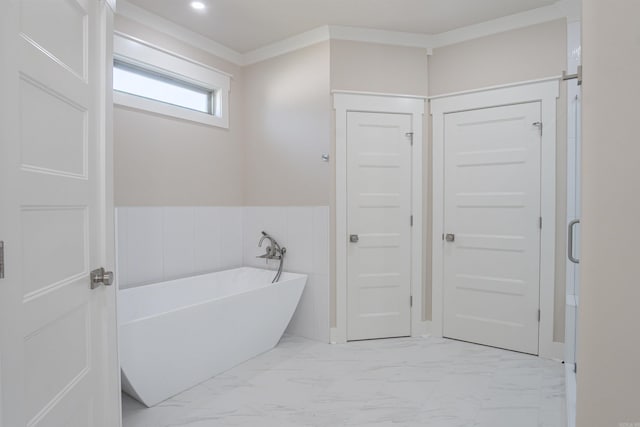 228 Michelle Dr, Beebe, AR 72012 - bathroom with marble finish flooring, a freestanding tub, and crown molding