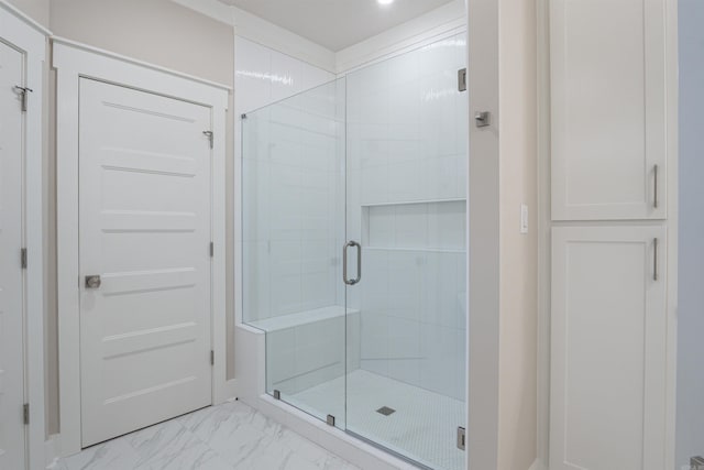 228 Michelle Dr, Beebe, AR 72012 - bathroom with marble look tile flooring and a stall shower