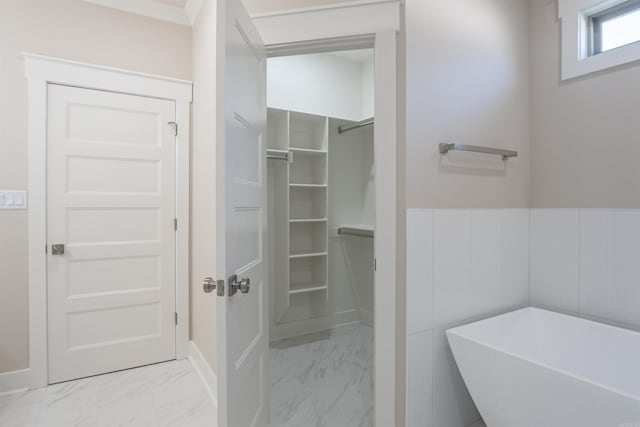 228 Michelle Dr, Beebe, AR 72012 - full bath featuring marble finish floors, a walk in closet, and a soaking tub