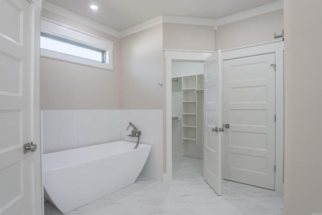 228 Michelle Dr, Beebe, AR 72012 - full bathroom with a freestanding tub, marble finish floors, a spacious closet, recessed lighting, and ornamental molding