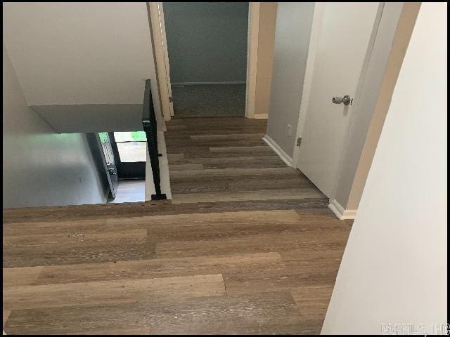 5507 Southboro Ct, Little Rock, AR 72209 - stairway featuring baseboards and wood finished floors