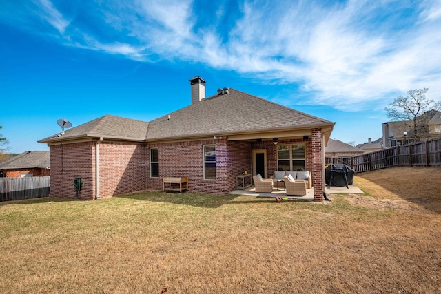 3 Commentry Dr, Little Rock, AR 72223 - rear view of property with a patio, brick siding, a fenced backyard, an outdoor hangout area, and a yard